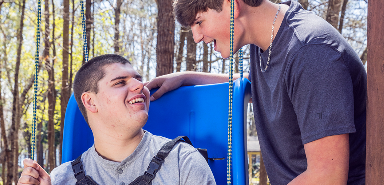An image of Hayden, living with Dravet syndrome, and his brother.